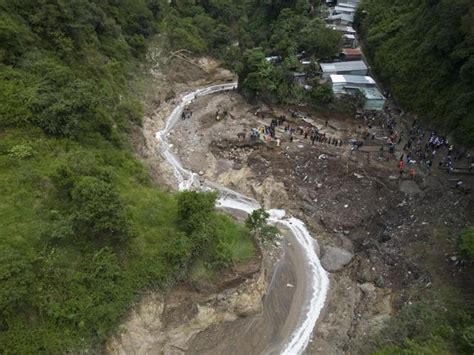 At least 6 people are dead and 12 missing after flash flood in Guatemala sweeps homes into river